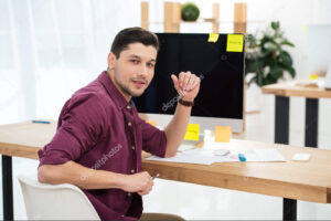 depositphotos_188119132-stock-photo-young-marketing-manager-looking-camera